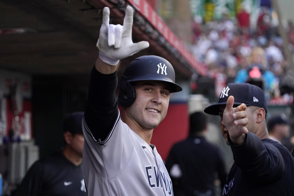 New York Yankees' Anthony Rizzo gestures toward cameras after hitting a solo home run during the second inning of a baseball game against the Los Angeles Angels Tuesday, Aug. 30, 2022, in Anaheim, Calif. (AP Photo/Mark J. Terrill)