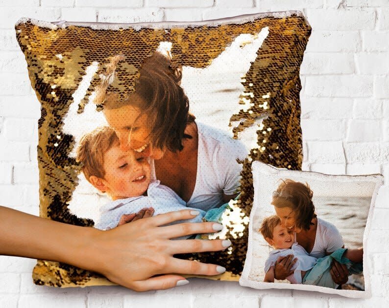 Pick the photo and color for this personalized sequin pillow. Perfect for friends, family and partners.&nbsp;<a href="https://fave.co/30jPeJT" target="_blank" rel="noopener noreferrer">Find it for $25 on Etsy</a>.