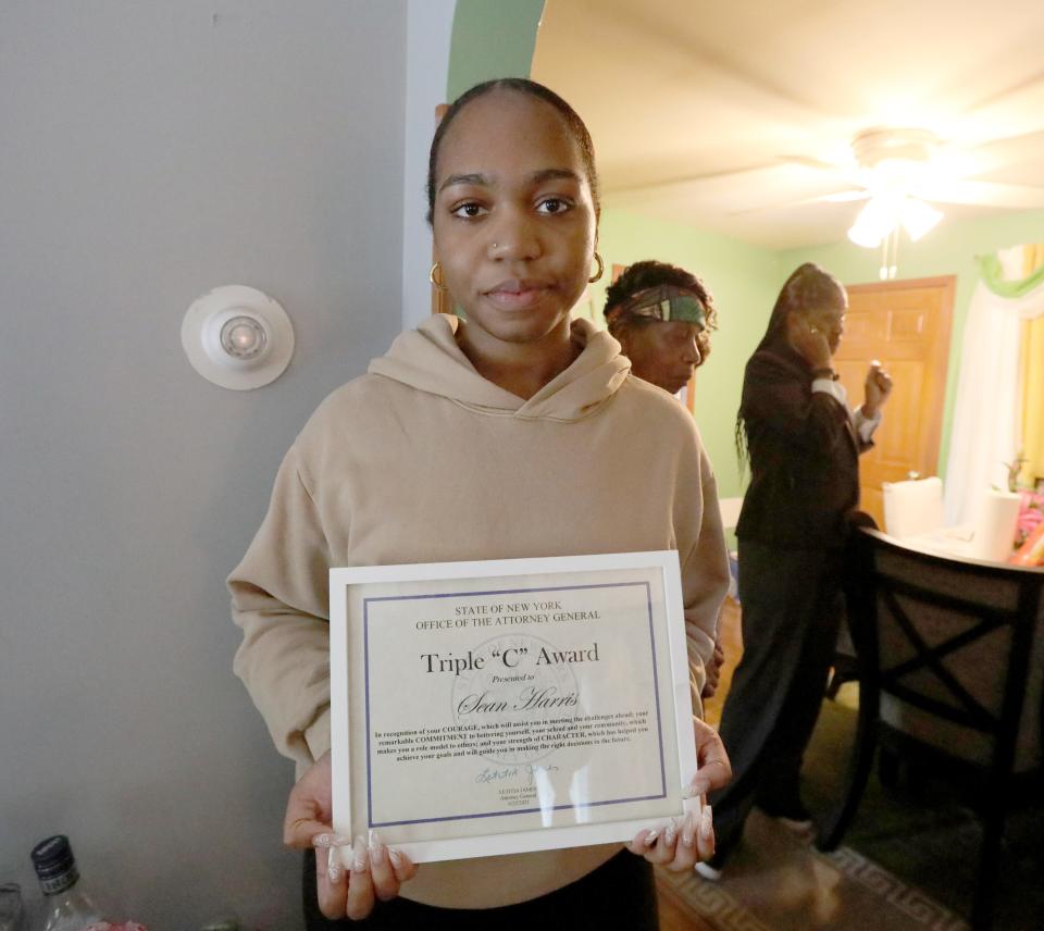 Kayla Charpentier shows a certificate awarded to her cousin, Sean Harris, at his home in Central Nyack June 9, 2023. Harris, died at the house after Clarkstown police went there based on a call from a social worker.