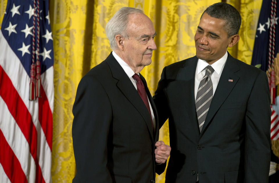 FILE - In this Feb. 15, 2013 file photo, President Barack Obama presents a 2012 Citizens Medal to former Pennsylvania Sen. Harris Wofford, in the East Room of the White House in Washington. Wofford, a civil rights activist who staged an upset Senate win in 1991, has died. He was 92. Wofford died late Monday, Jan. 21, 2019, of complications from a fall in his Washington, D.C., apartment, his son, Daniel Wofford, said. (AP Photo/Jacquelyn Martin, File)