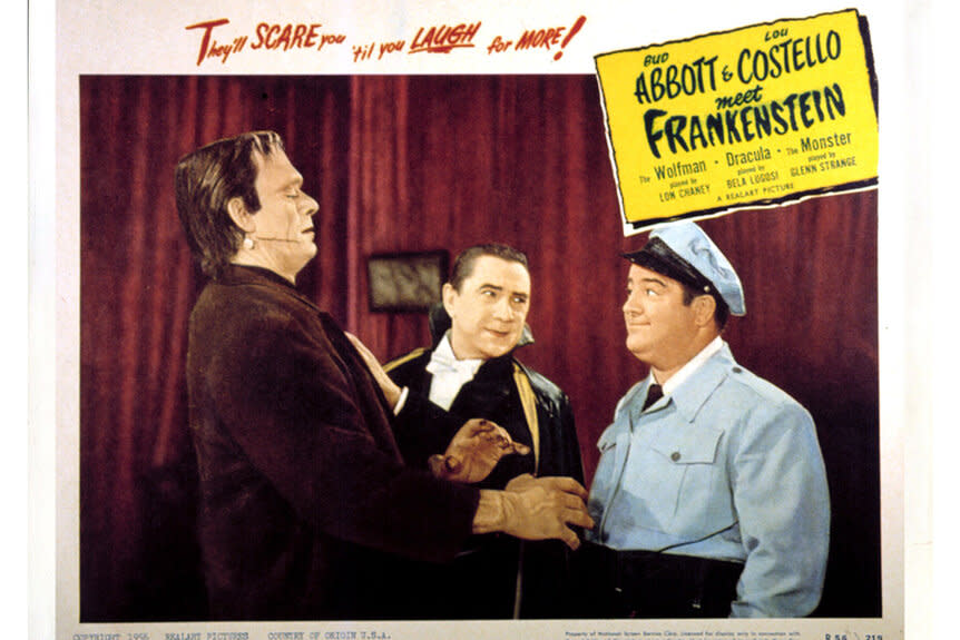 Frankenstein (Glenn Strange) and Dracula (Bela Lugosi) interact with Lou Costello in Abbott And Costello Meet Frankenstein (1948)