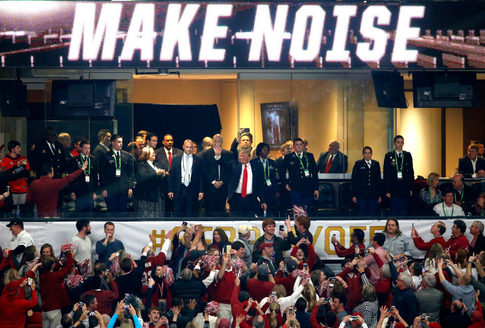 <p>U.S. President Donald Trump waves to fans prior to the CFP National Championship presented by AT&T between the Georgia Bulldogs and the Alabama Crimson Tide at Mercedes-Benz Stadium on January 8, 2018 in Atlanta, Georgia. (Photo by Mike Zarrilli/Getty Images) </p>