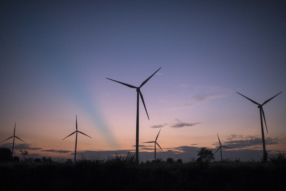 You can get £100 for switching to a green energy firm. Getty Images