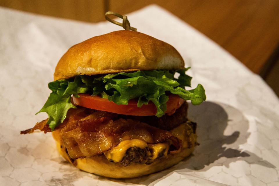 A close-up of a hamburger from Market Street Burger & Dog at The Chancery Market in Wilmington on Wednesday, March 15, 2023.