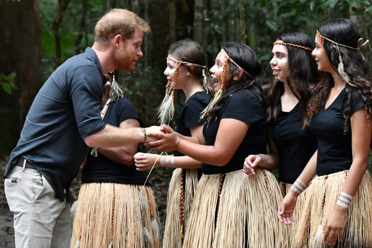 Britain's Prince Harry talked to members of the Butchulla people, who are the traditional owners of Fraser Island, during his visit