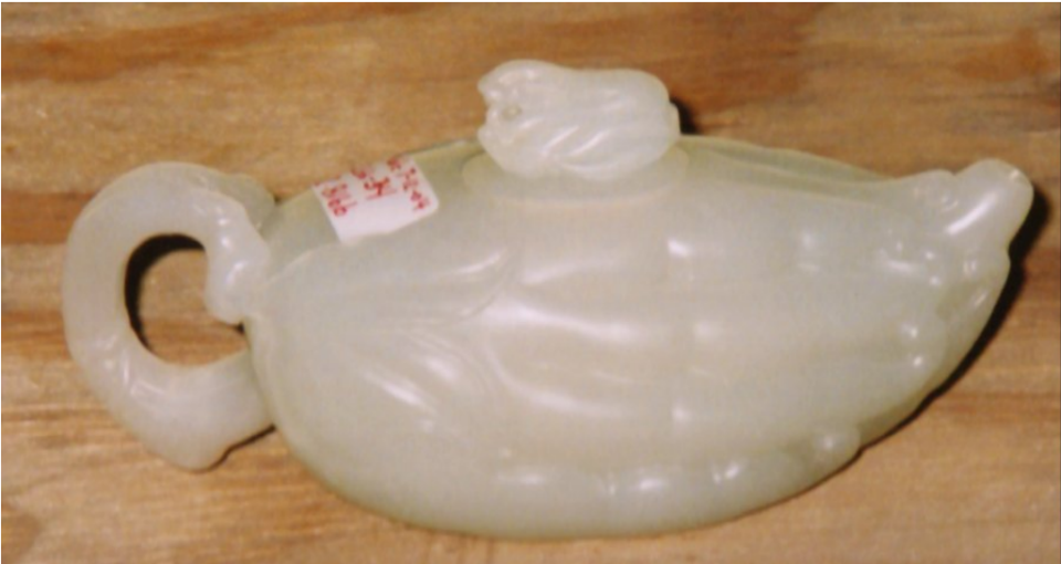The teapot, shown here, was stolen Sunday morning. It is about 250-years-old and carved from white jade.
