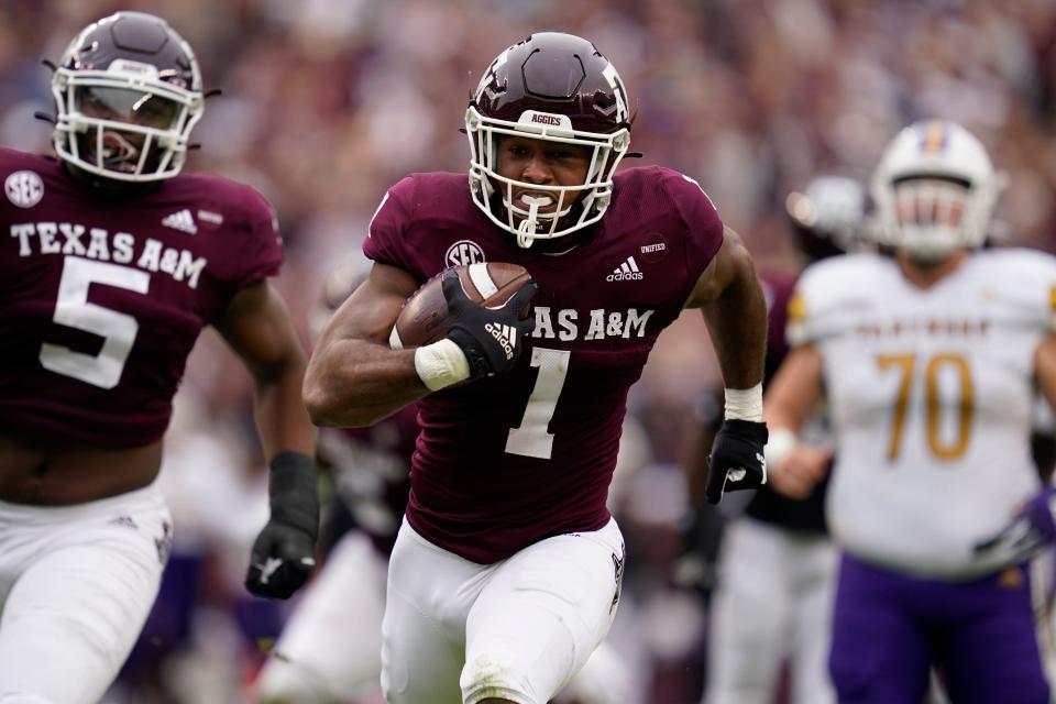 Texas A&amp;M linebacker Aaron Hansford returns a fumble for a touchdown during a game against Prairie View A&amp;M on Nov. 20.