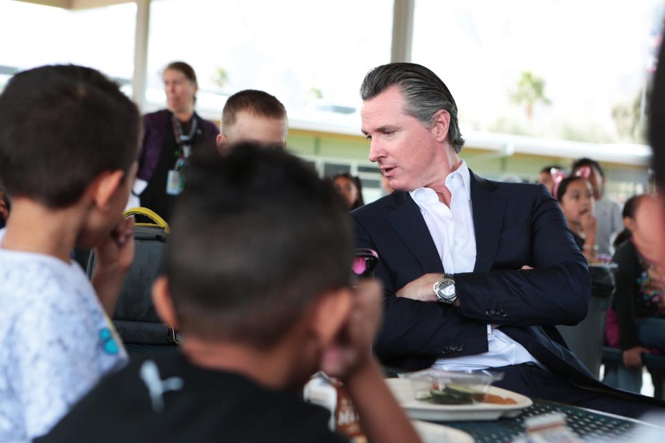 Governor Gavin Newsom talks to first-graders at Vista Del Monte Elementary School in Palm Springs, Calif., on February 28, 2020. Newsom visited the school to raise awareness and support for Proposition 13.