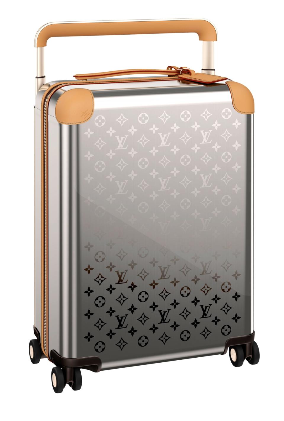 <p>“We’ve used a very innovative titanium composite—and had lots of fun laser-engraving Louis Vuitton monograms.” —Marc Newson</p> <p>LOUIS VUITTON Horizon 55 suitcase by Marc Newson; price upon request. <a rel="nofollow noopener" href="https://www.louisvuitton.com/" target="_blank" data-ylk="slk:louisvuitton.com;elm:context_link;itc:0;sec:content-canvas" class="link ">louisvuitton.com</a></p>