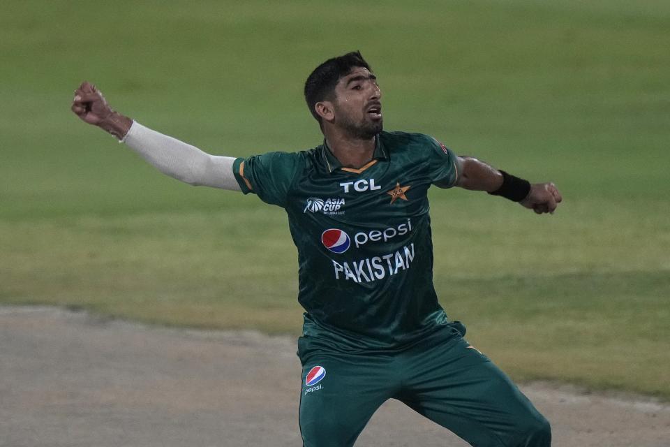 Pakistan's Shahnawaz Dahani celebrates after taking the wicket of Hong Kong's Yasim Murtaza during the T20 cricket match of Asia Cup between Pakistan and Hong Kong, in Sharjah, United Arab Emirates, Friday, Sept. 2, 2022. (AP Photo/Anjum Naveed)