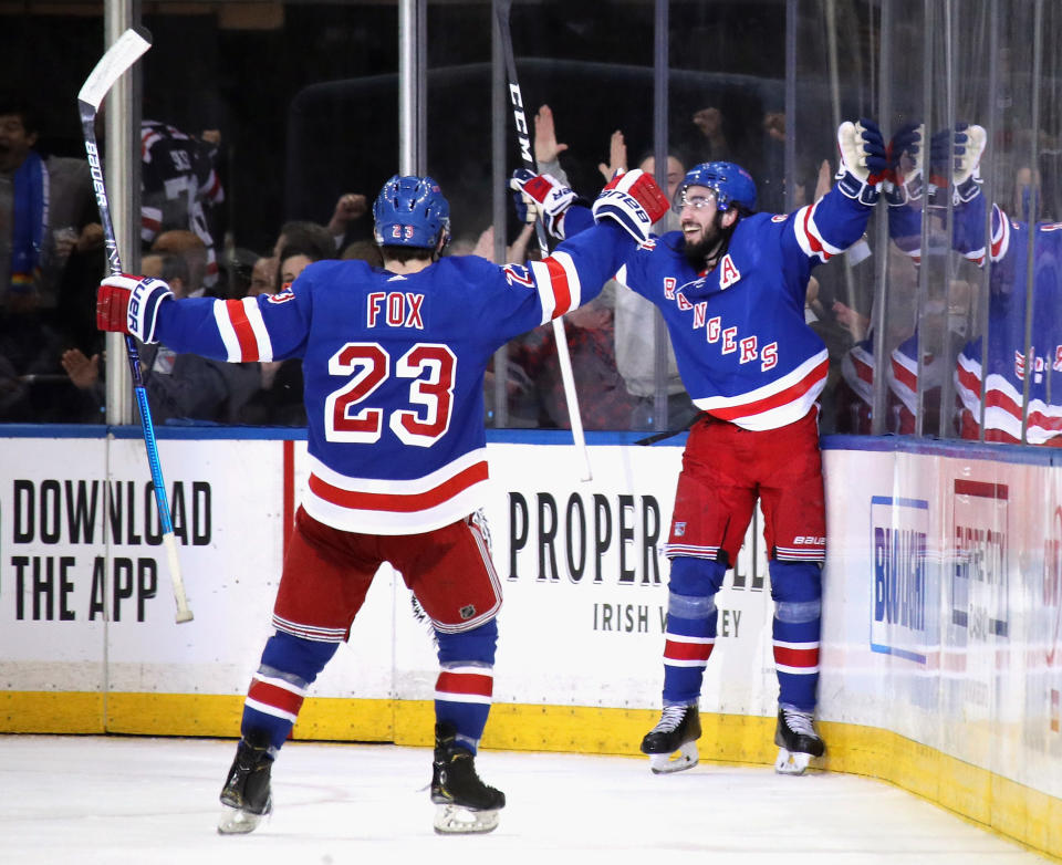 NEW YORK, NEW YORK - MARCH 05: Mika Zibanejad #93 of the New York Rangers celebrates his hattrick goal at 12 seconds of the third period against the Washington Capitals at Madison Square Garden on March 05, 2020 in New York City. The Rangers defeated the Capitals 5-4 in overtime. (Photo by Bruce Bennett/Getty Images)