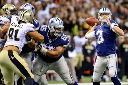 Oct 4, 2015; New Orleans, LA, USA; Dallas Cowboys quarterback Brandon Weeden (3) throws the ball against the New Orleans Saints during the fourth quarter at the Mercedes-Benz Superdome. Derick E. Hingle-USA TODAY Sports