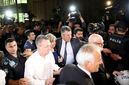 U.S. pastor Andrew Brunson and his wife Norrine arrive at the airport in Izmir, Turkey October 12, 2018. REUTERS/Umit Bektas