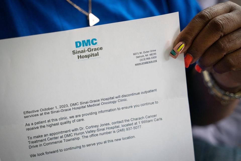 Anitta Y. Orr holds a letter she received regarding the upcoming closure of DMC Sinai-Grace Hospital's Medical Oncology Clinic at her home in Detroit on Monday, Sept. 18, 2023.