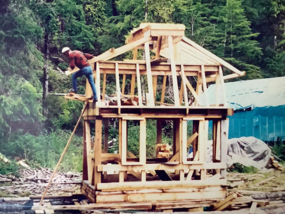 A building being constructed with wood.