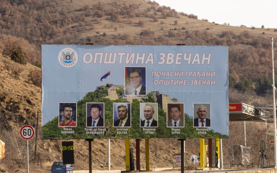 A billboard declaring Vladimir Putin, as well as President Vucic of Serbia and Novak Djokovic, honorary citizens of this part of Kosovo - Heathcliff O'Malley