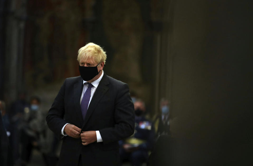 Britain's Prime Minister Boris Johnson looks on during a service to mark the 80th anniversary of the Battle of Britain at Westminster Abbey, London, Sunday, Sept. 20, 2020. (Aaron Chown/Pool Photo via AP)