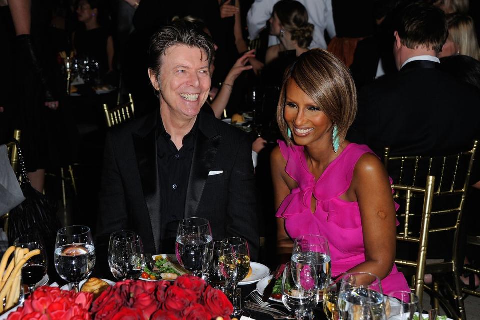 Loved up: David Bowie and his wife Iman at a charity event in 2011 (Getty Images)