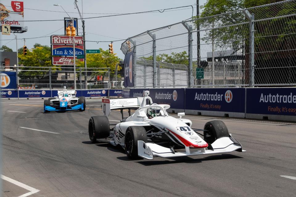 Indy NXT cars practice at turn 2 during the Free Prix Day of Detroit Grand Prix in Detroit on Friday, June 2, 2023.