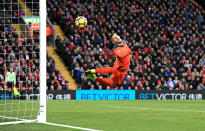 <p>Southampton goalkeeper Fraser Forster dives as Liverpool’s Mohamed Salah scores his side’s first goal of the game during the English Premier League soccer match Liverpool versus Southampton at Anfield, Liverpool, England, Saturday Nov. 18, 2017. (Peter Byrne/PA via AP) </p>