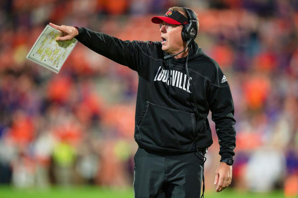 Louisville head coach Scott Satterfield looks on in the second half of an NCAA college football game against Clemson, Saturday, Nov. 12, 2022, in Clemson, S.C. (AP Photo/Jacob Kupferman)