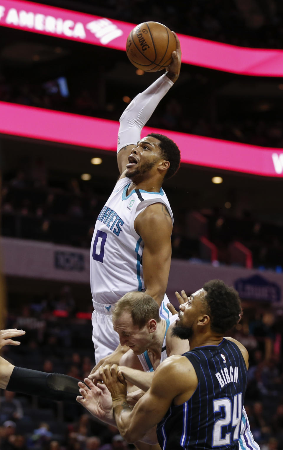 Charlotte Hornets forward Miles Bridges drives the lane to dunk against the Orlando Magic in the first half of an NBA basketball game in Charlotte, N.C., Monday, Jan. 20, 2020. (AP Photo/Nell Redmond)