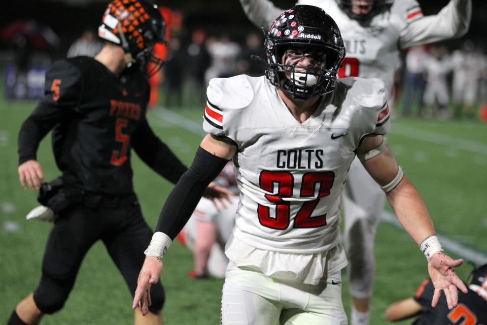 Thurston's Vaun Halstead celebrates a tackle for loss during Saturday's Class 5A football championship against Silverton at Hillsboro Stadium in November 2021.