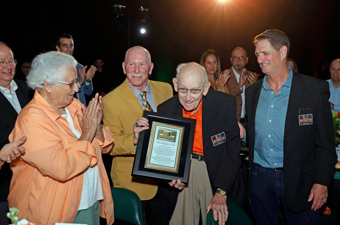 G. Holmes Braddock, 98, receives the President’s Distinguished Service Award at the University of Miami’s Sports Hall of Fame & Museum 54th Induction Banquet.