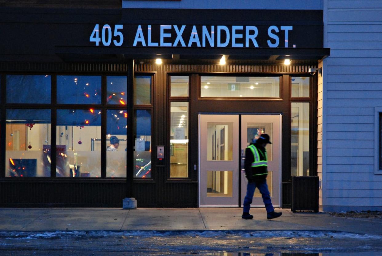 The shelter is located at 405 Alexander Street. It provides temporary emergency housing to community members in need of a bed, hot meal, shower, laundry and access to medical aid.  (Philippe Morin/CBC - image credit)