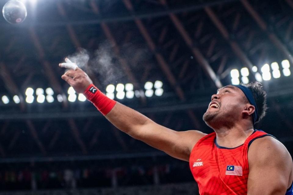 Malaysia's Muhammad Ziyad Zolkefli competes in the final of the men's shot put - F20 at the Tokyo 2020 Paralympic Games