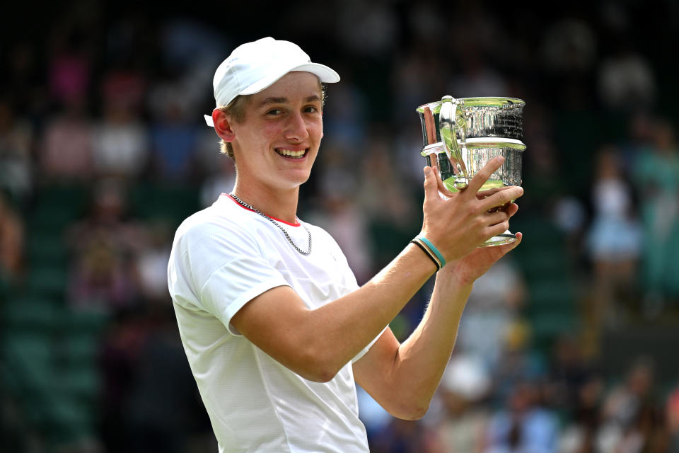 LONDON, ENGLAND - JULY 16: Henry Searle lifts the Boys' Singles Trophy following victory against Yaroslav Demin (Getty Images for LTA)