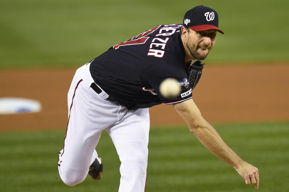 Washington Nationals starting pitcher Max Scherzer throws against the Los Angels Dodgers during the first inning in Game 4 of a baseball National League Division Series, Monday, Oct. 7, 2019, in Washington. (AP Photo/Susan Walsh)