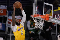 Los Angeles Lakers center Andre Drummond (2) goes up for a shot against the Utah Jazz during the first half of an NBA basketball game Monday, April 19, 2021, in Los Angeles. (AP Photo/Marcio Jose Sanchez)