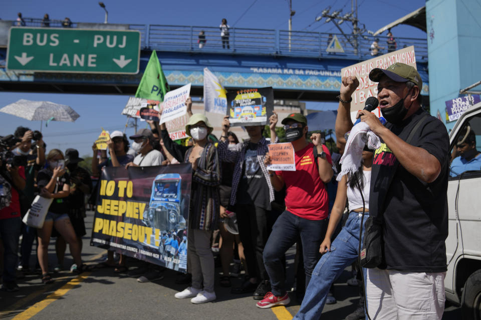 A jeepney driver shouts slogans during a transport strike in Quezon city, Philippines on Monday, March 6, 2023. Philippine transport groups launched a nationwide strike Monday to protest a government program drivers fear would phase out traditional jeepneys, which have become a cultural icon, and other aging public transport vehicles. (AP Photo/Aaron Favila)