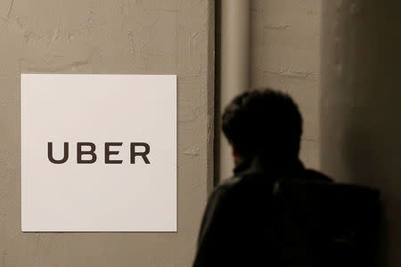 A man arrives at the Uber offices in Queens, New York, U.S., February 2, 2017. REUTERS/Brendan McDermid