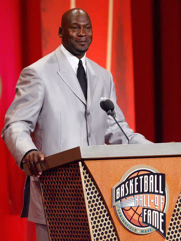 <p>Jim Rogash/Getty</p> Michael Jordan is inducted into the Naismith Memorial Basketball Hall of Fame in 2009