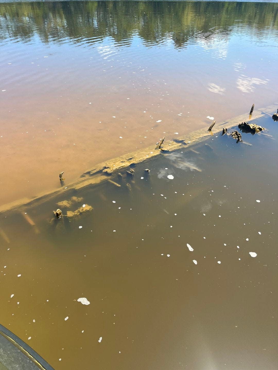 Bill Milner, who grew up on the Neches River, found the remains of five ships in the low water. They turned out to be emergency freight vessels built of wood during World War I. They were abandoned after the war. The Texas Historical Commission has documented the sites of dozens of such sunken ships in the Sabine and Neches rivers.