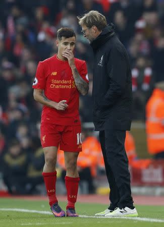 Football Soccer Britain - Liverpool v Sunderland - Premier League - Anfield - 26/11/16 Liverpool's Philippe Coutinho with manager Juergen Klopp Action Images via Reuters / Lee Smith Livepic