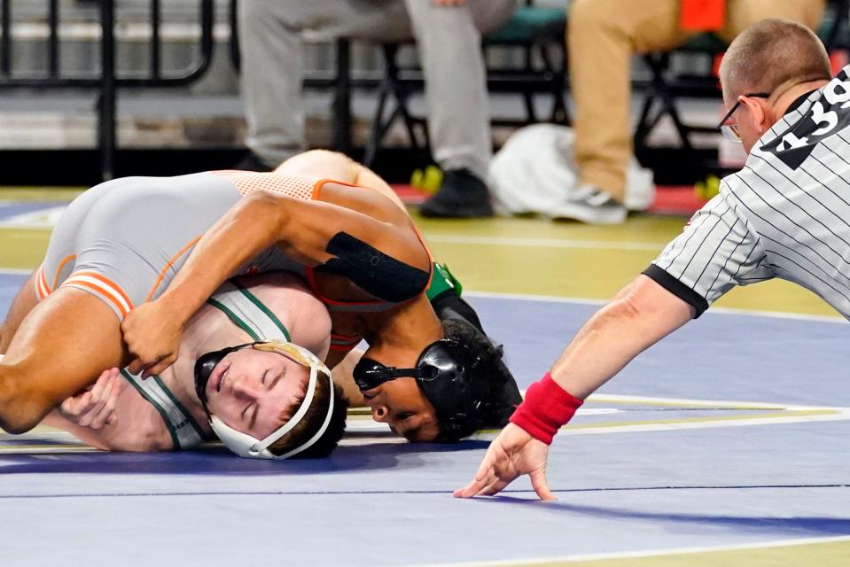 Jeremy Quezada of Dumont pins Tyler Whitford of St. Joseph (Metuchen) in 48 seconds in the 144-pound bout on day one of the NJSIAA state wrestling tournament in Atlantic City on Thursday, March 2, 2023.