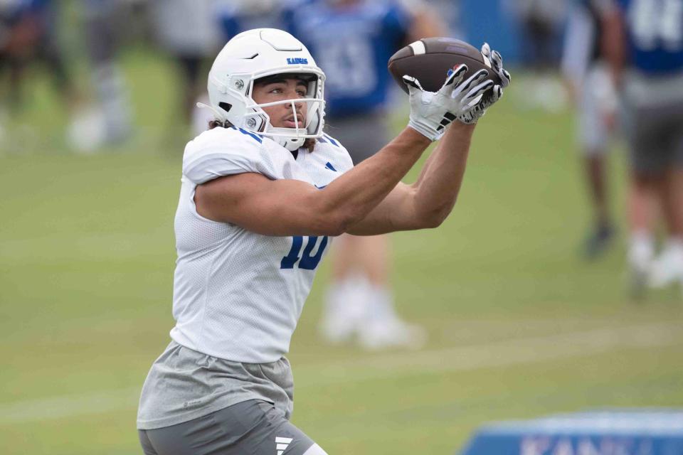 Kansas football redshirt junior linebacker Jayson Gilliom (10) competes for the Jayhawks during a practice Aug. 6 in Lawrence.