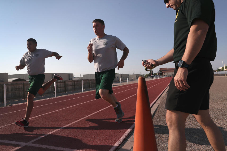 <p>U.S. Border Patrol trainees run during a physical training class at the U.S. Border Patrol Academy on August 3, 2017 in Artesia, N.M. (Photo: John Moore/Getty Images) </p>