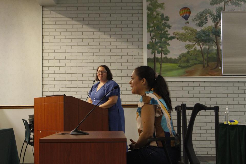 Lisneidy Ortiz, a parent to her elementary school-aged son, speaks at the June 7 SCCPSS board meeting about the importance of bilingual services. For this meeting, the school district provided a translator so that parents like Ortiz can be heard.