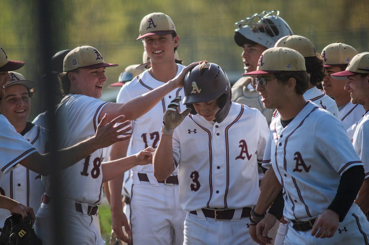 Arlington's Jason Jackson celebrates with teammates after a hitting a home run against John Jay during an April 30, 2024 baseball game.