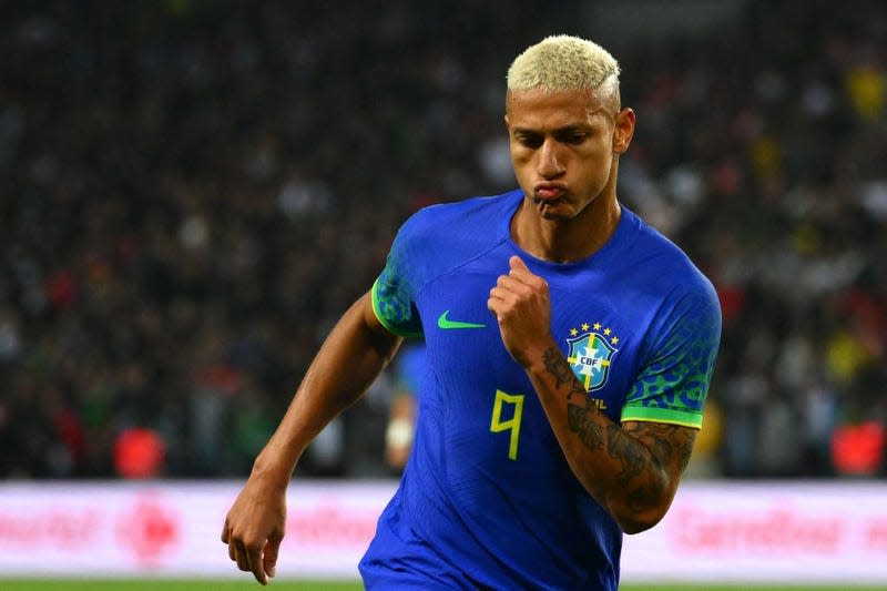 Brazil’s forward Richarlison celebrates after scoring his team’s second goal during the friendly football match between Brazil and Tunisia at the Parc des Princes in Paris on September 27, 2022