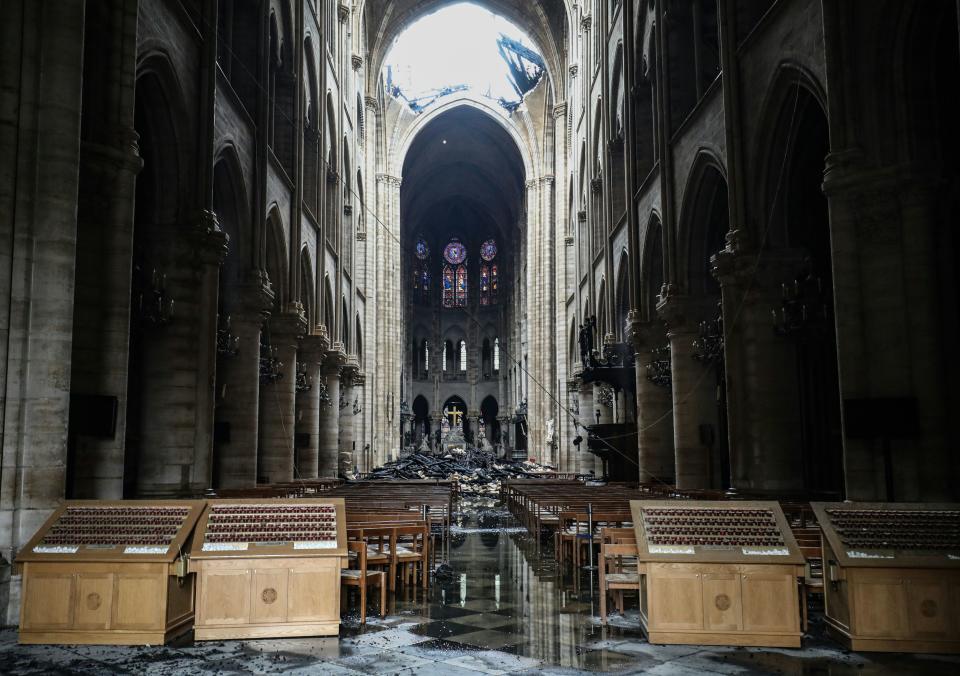 Inside, debris gathers on the floor and a hole in the ceiling exposes the church to the elements.