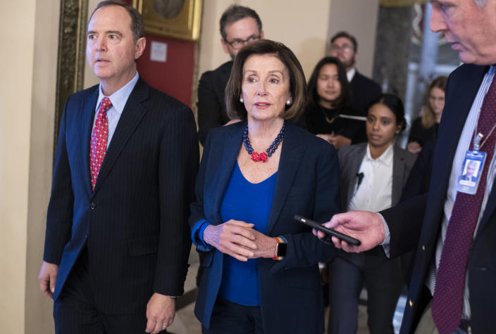 UNITED STATES - OCTOBER 18: Speaker of the House Nancy Pelosi, D-Calif., and House Intelligence Chairman Adam Schiff, D-Calif., make their way to the floor for the last House votes of the week on Friday, October 18, 2019. (Photo By Tom Williams/CQ-Roll Call, Inc via Getty Images)