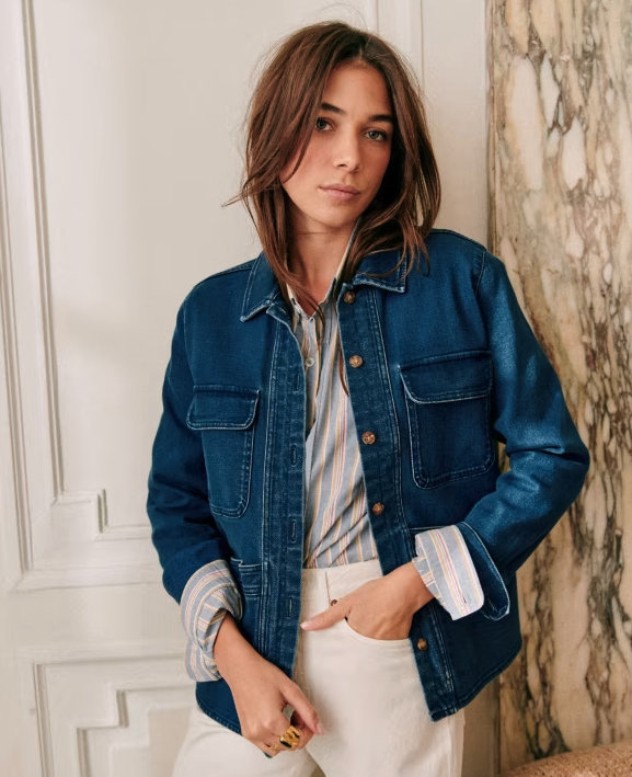 woman wears blue denim Willa Jacket Sézane.