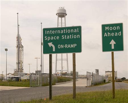 Signs are seen near launch Pad-OA as the Orbital Sciences Corporation Antares rocket, with its Cygnus cargo spacecraft aboard, is prepared for an upcoming launch in this handout photo taken at the NASA Wallops Flight Facility, Virginia September 16, 2013. REUTERS/Bill Ingalls/NASA/Handout