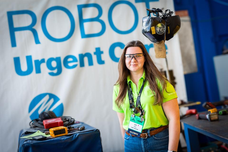 FPL employee Elizabeth Pawlak at the FIRST Robotics Competition on March 1 where hundreds of high school student built and battled robots at the competition.