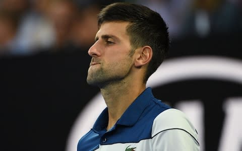 Serbia's Novak Djokovic reacts during their men's singles fourth round match against South Korea's Hyeon Chung on day eight of the Australian Open tennis tournament in Melbourne on January 22, 2018 - Credit: AFP